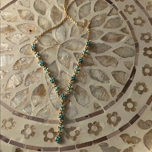 Elegant Gold and Turquoise Necklace